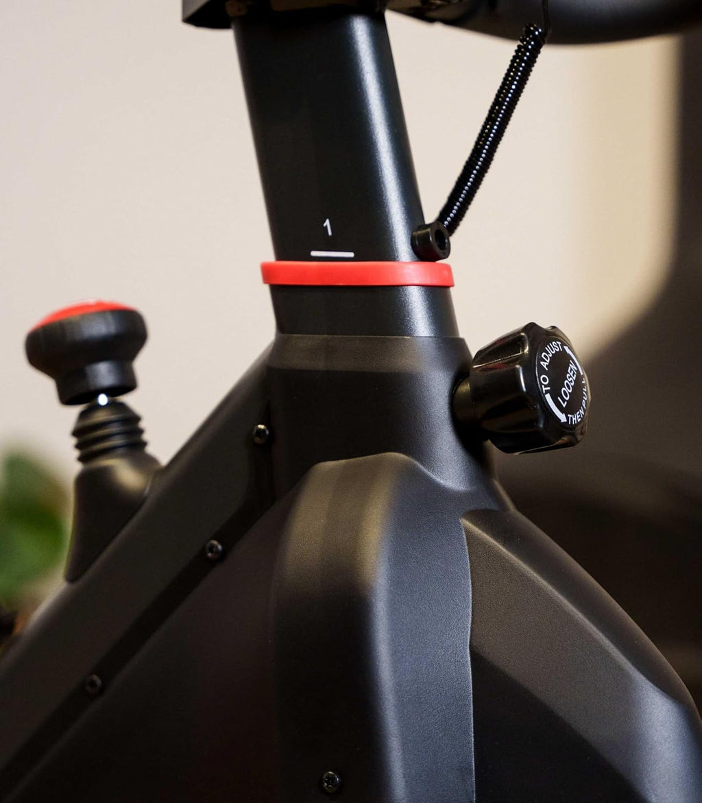 CARE FITNESS - Vélo de Biking- Racing - 7 Fonctions Essentielles - Confortable et Pratique - Stabilité et Bonne Posture Garantie - Masse d'Inertie 12 kg