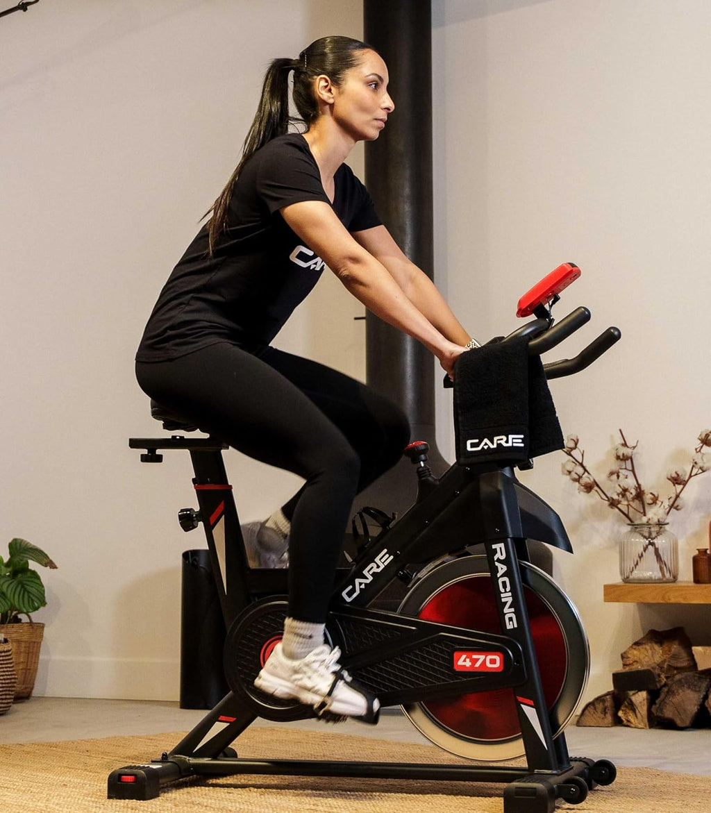 CARE FITNESS - Vélo de Biking- Racing - 7 Fonctions Essentielles - Confortable et Pratique - Stabilité et Bonne Posture Garantie - Masse d'Inertie 12 kg