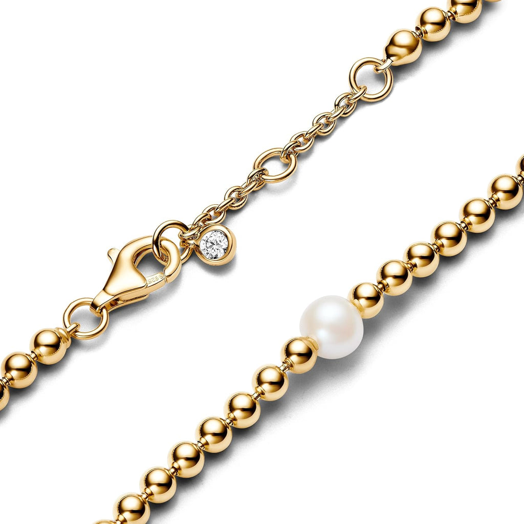 PANDORA Timeless Bracelet Sphère en métal plaqué or 14 carats avec perle de culture d’eau douce traitée blanche et zircones cubiques transparentes